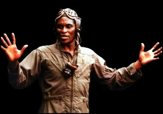 A Tuskegee Repertory Theatre performer portraying an aviator on stage