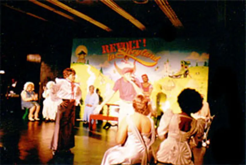 An ensemble performing on the Revolt in Storyland stage